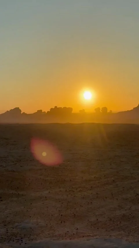 Sunset in the White Desert, Egypt, driving a car Stock Footage 313541651