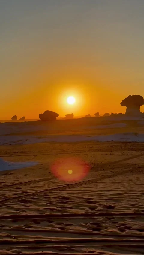 Sunset in the White Desert, Egypt, driving a car Stock Footage 313541664