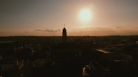Sunset wide Clock tower aerial Pan Stock Footage 240063624