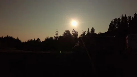 Sunset with wild-campers in the foreground Stock Footage 230274062