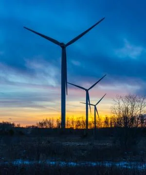 Sunset with Wind turbine Stock Photos