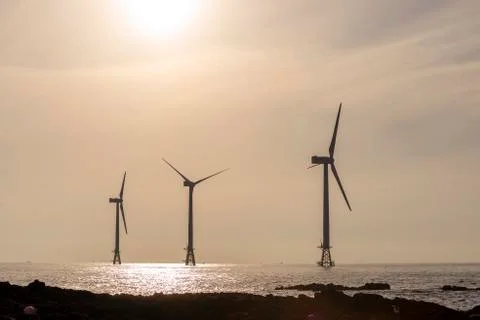  Sunset at the Wind Turbine Stock Photos