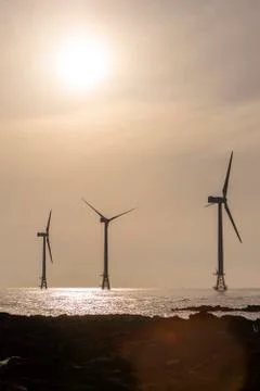  Sunset at the Wind Turbine Stock Photos