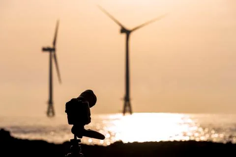  Sunset at the Wind Turbine Stock Photos
