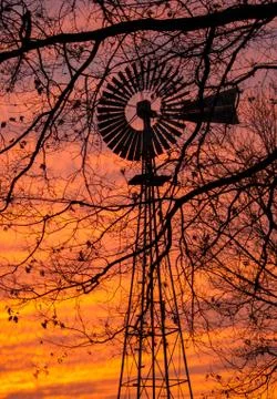 Sunset windmill silhoutte Stock Photos