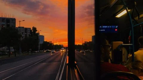 A sunset from the window of a bus 스톡 사진