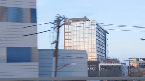 Sunset on Windows of Building Outside of Boston, Massachusetts Stock Footage 92642173