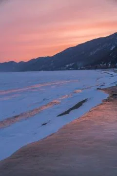 Sunset on the winter Baikal Stock Photos