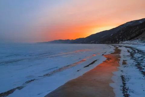 Sunset on the winter Baikal Stock Photos