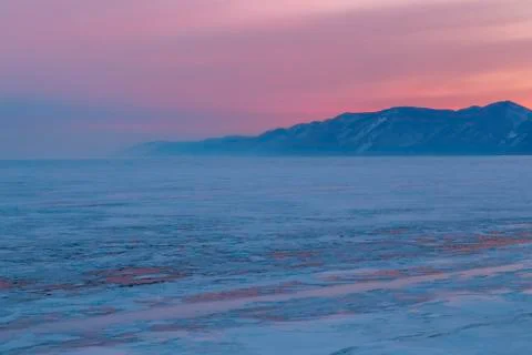Sunset on the winter Baikal Stock Photos
