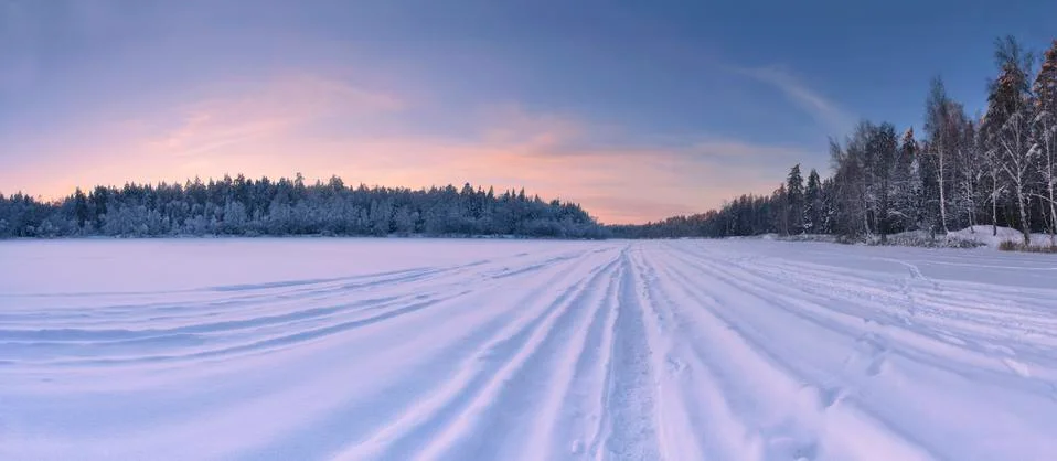Sunset in winter field Stock Photos