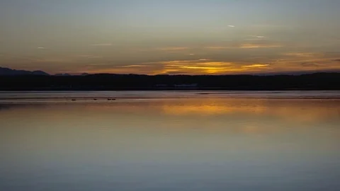 Sunset at the winter lake 스톡 동영상 75608596