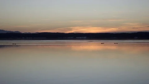 Sunset at the winter lake 스톡 동영상 75718996