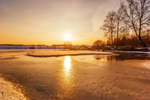 Sunset on the winter lake Stock Photos