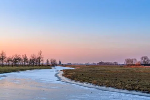 Sunset winter landscape Stock Photos