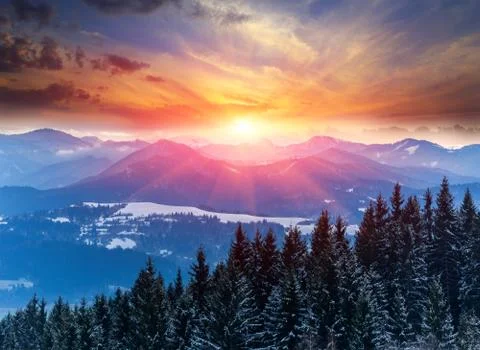 Sunset in winter mountains Stock Photos