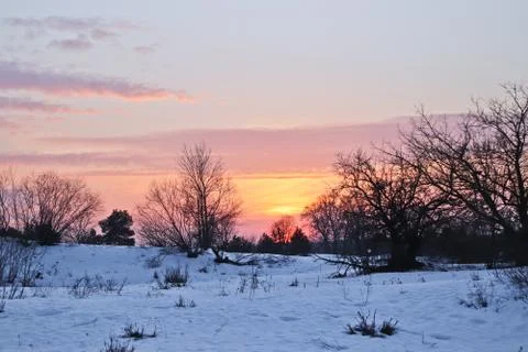Sunset in the winter Stock Photos