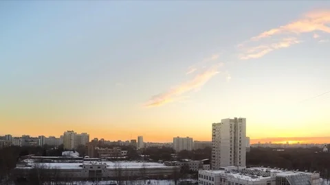 Sunset in winter sky in town timelapse Stock Footage 79815457