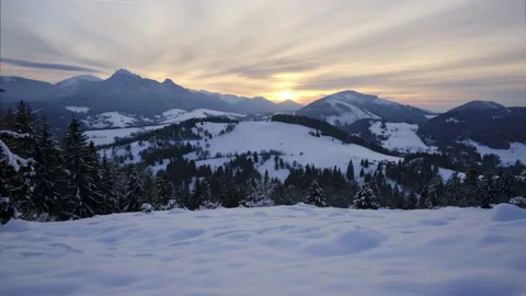 Sunset in winter snowy mountain scenery, slow movement of clouds ,timelapse Stock-Footage 231987341
