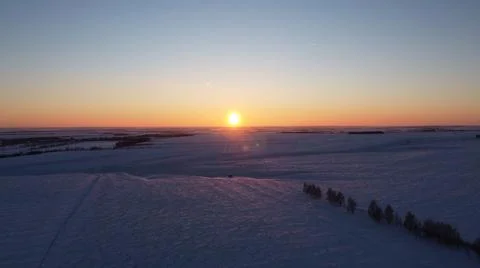 Sunset in winter. Winter forest texture. Aerial view Stock Photos