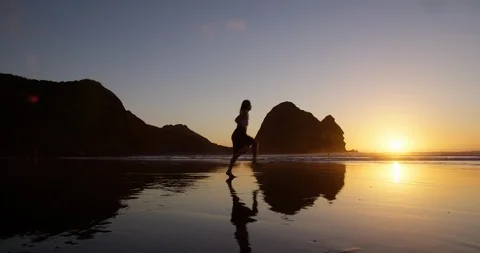 SUNSET WOMAN DANCING Stock Footage 125409407
