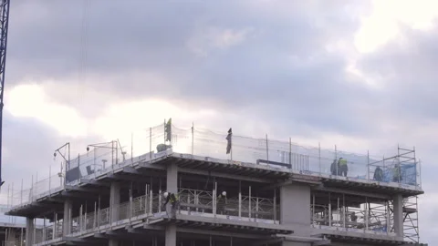 Sunset On Workers On A Construction Site Stock-Footage 150757432