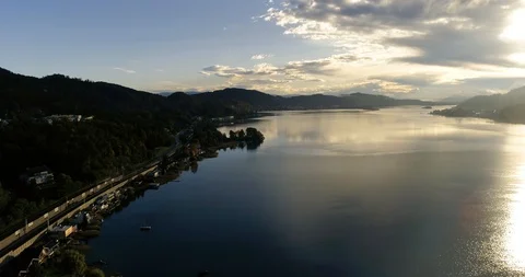 Sunset in the Worthersee lake, view from drone, Austria, Europe Stock Footage 109381653