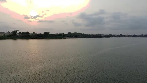 Sunset on Wouri river and Douala bay neighborhood Stock Footage 80937639