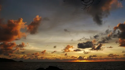 Sunset yellow gold beam light cloudy sky  into the sea with silhouette dry br Video stock 95655394