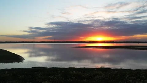 Sunset on yellow  river Stock Footage 259380223