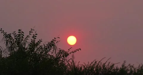 Sunset in the Yellow Sky. Big bright Yellow sun moves down. Awesome landscape Stock Footage 221106564