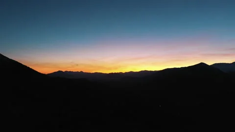Sunset in the Yellow Sky. Big bright Yellow sun moves down. Stock Footage 234095894