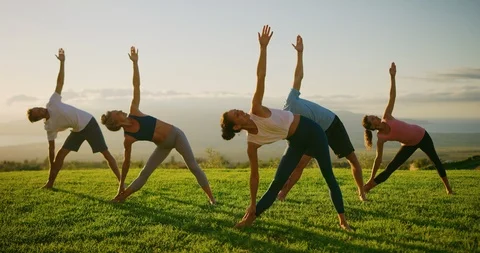 Sunset yoga class Stock Footage 105139285