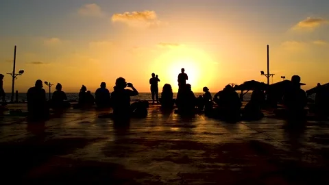 Sunset yoga classes on the Mediterranean coast. Healthy Living. Stock Footage 135692633
