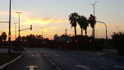 Sunset on Yom Kippur 2016, traffic lights blink, empty Rokach road, street signs Видео 80158329