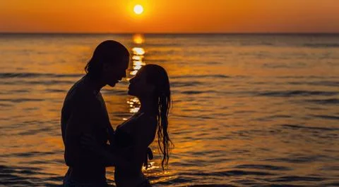 At sunset young couple Stock Photos