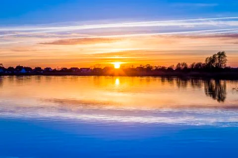 Sunset in zinnowitz with reflection on the water Stock Photos