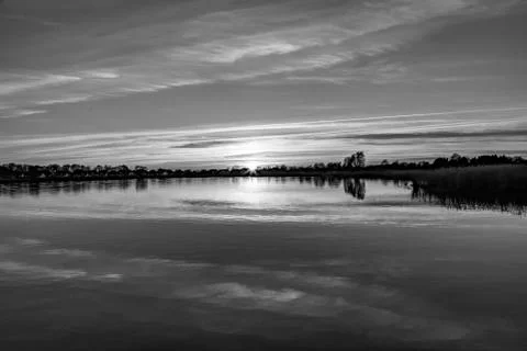Sunset in Zinnowitz with reflection on the water Stock Photos