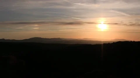 SUNSET ZOOM IN OVER MOUNTAINS Stock Footage 10710915