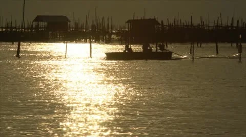 SunsetFishermenVillage Stock Footage 21891494