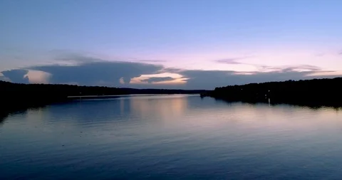 SunSetlowangleoverwater Stock Footage 98264957