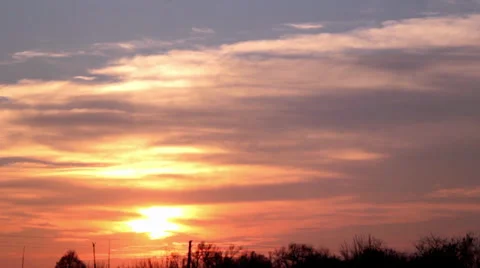 Sunset,racing clouds at sunset Stock Footage 32484156