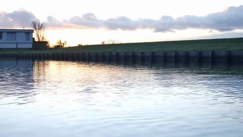 Sunset's reflections on canal Stock Footage 125261444