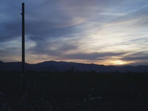 Sunset/Sunrise over the Mountain Stock Footage 74657921