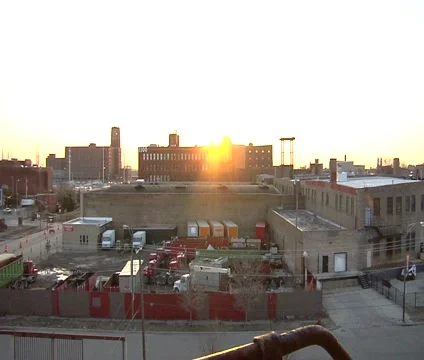 Sunsetting over buildings wide static Video stock 2319786