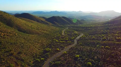 Sunsetting rotating down to desert floor.mp4 Stock Footage 54259955