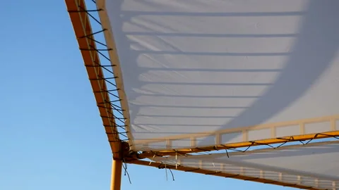 Sunshade in the wind Stock Footage 93461937