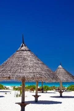 Sunshades on the beach Stock Photos