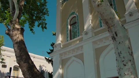 Sunshine and Shadows on a Classical Building Corner with Balcony Stock Footage 338244038