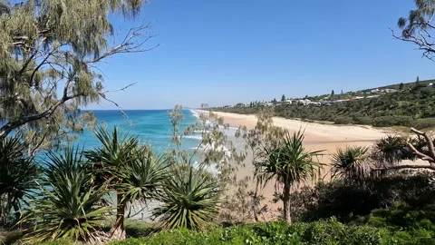 Sunshine Beach : Scenic Landscape with dramatic sweep of golden sand in Noo.. Stock Footage 284047021